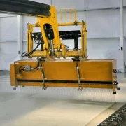 Contop topping spreader mounted to telehandler applying dry shake toppings